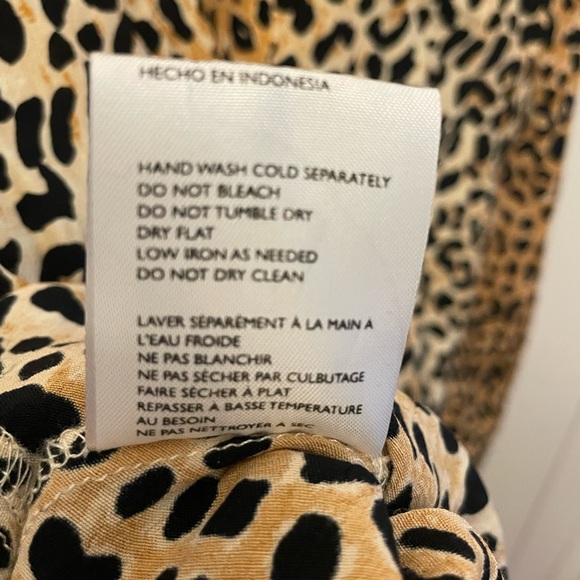 Faithfull the Brand Marie Louise midi dress in a leopard print. - Picture 7 of 9